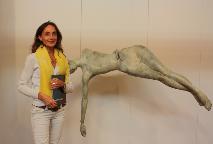Artist Anne Sophie Morelle in front of her sculpture Diaphane