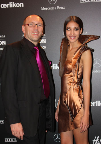 CEO of Oerlikon Michael Buscher with model showing the Wensibo collection at the Mercedes Benz Fashion Days in Zurich