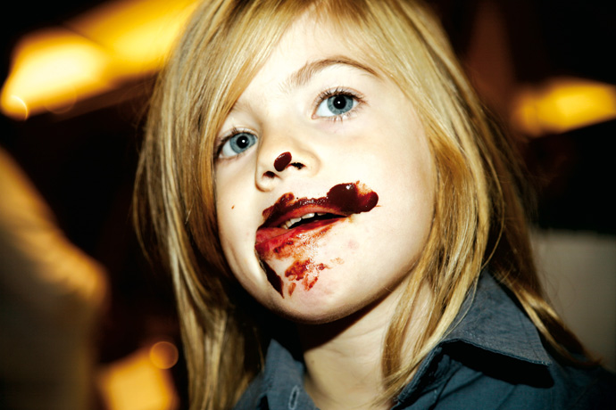 Child face while eating some chocolate - copyright salon du chocolat