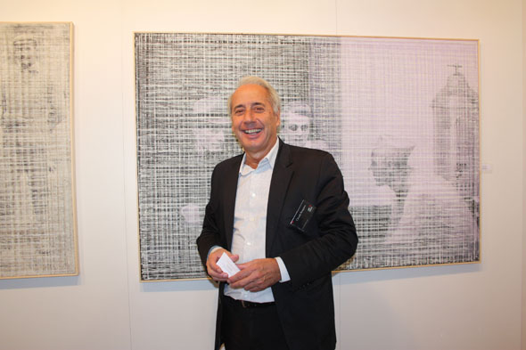 Claude Roegiers with his photo artwork at Art International in Zurich