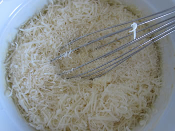 Cheeses in bowl with cream and eggs