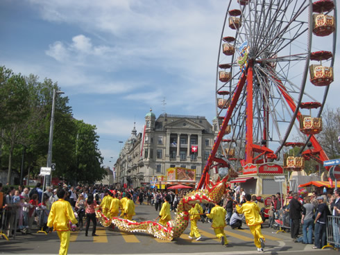 Children's parade, Sechselaüten in Zurich - Chinese men with dragon