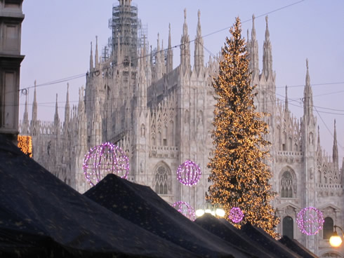 Milan cathedral with its Christmas tree, taken from the Christmas markets