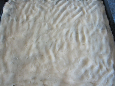 dough for tuna tarte on cooky sheet pan