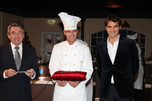 Roger Federer, Maitre chocolatier and CEO Ernst Tanner at Lindt headquarters before the opening of the chocolateria