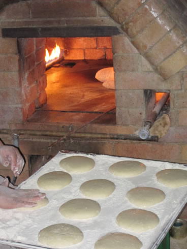 Flat bread cooked outside in an oven 