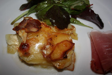 gratin dauphinois with side salad and mountain ham