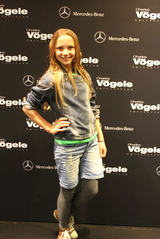 Jacqueline happy in front of the camera after the Kids Fashion Show, Charles Voegele 