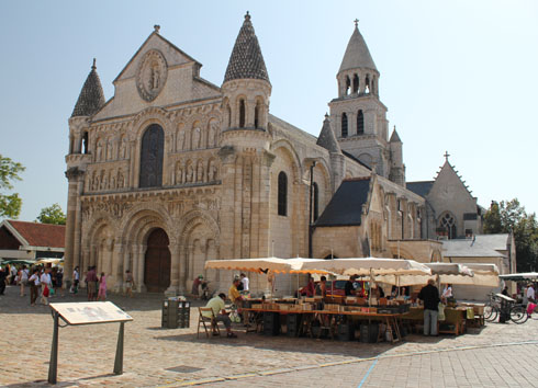 The Poitiers market square and Notre Dame la Grande church