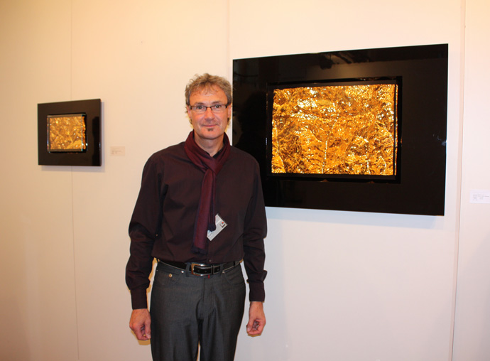 Markus Stoller with his 3D relief artworks