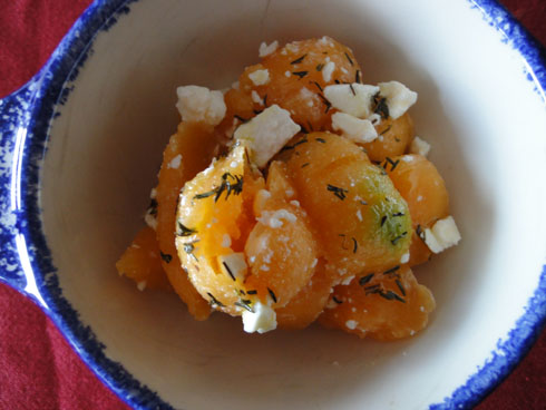 Melon balls with herbs and feta dices