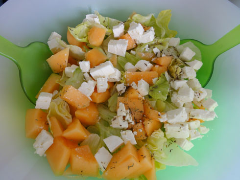 Melon and feta salad in serving dish 