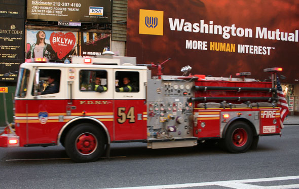 New York firetruck driving on Broadway