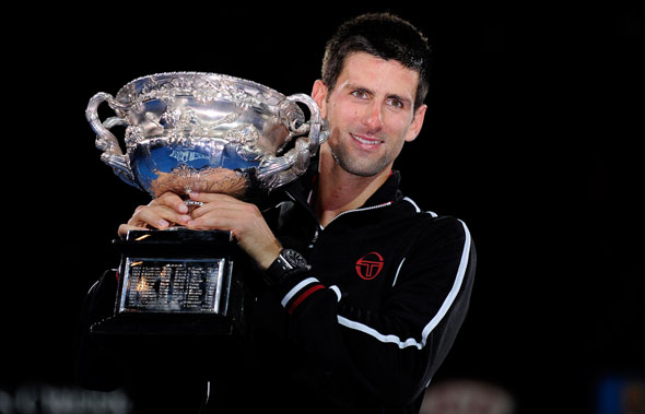 Novak Djokovic holding his prize at the Australian Final 2012 - Copyright Ben Solomon - Tennis Australia