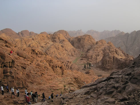 pilgrims going down Mount Sinai in early morning