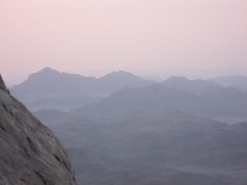 Sunrise over mountain peaks from Mount Sinai 5:48 a.m.