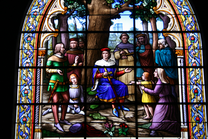 Stain glass window, Notre Dame La Grande church in Poitiers (France)
