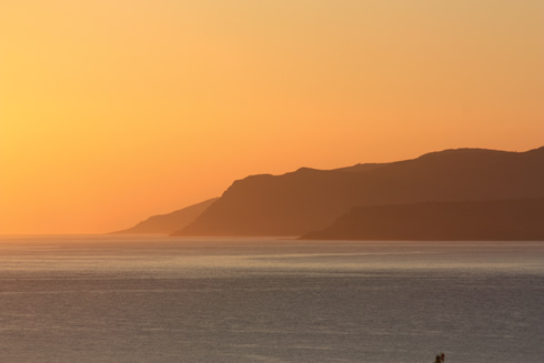 Orange sky on Malia Bay in Crete