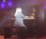 emily-bear-playing-the-piano-at-the-after-show-party
