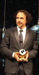 gonzalez-inarritu-hodling-his-prize-award-night-at-the-zurich-film-festival