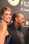 nadja-schildknecht-and-laurence-fishburne-on-the-green-carpet-2-opening-night